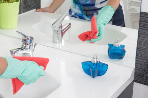 Cleaning specialist handling waste and equipment safely