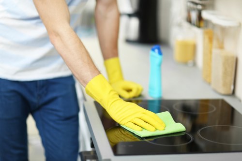 Detailed kitchen and cupboard cleaning during a Richmond move in clean