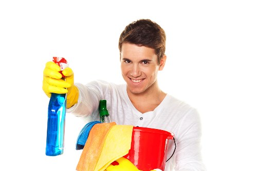 Local window cleaner working on glass in Richmond